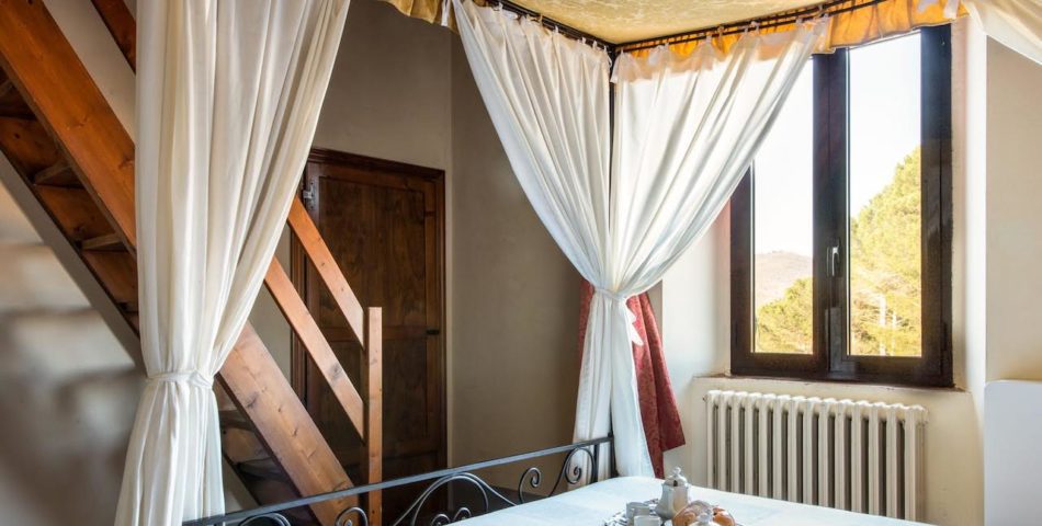 authentic tuscan villa posted bed view