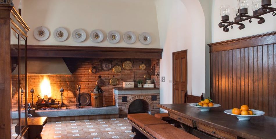 Old tuscan kitchen with fireplace